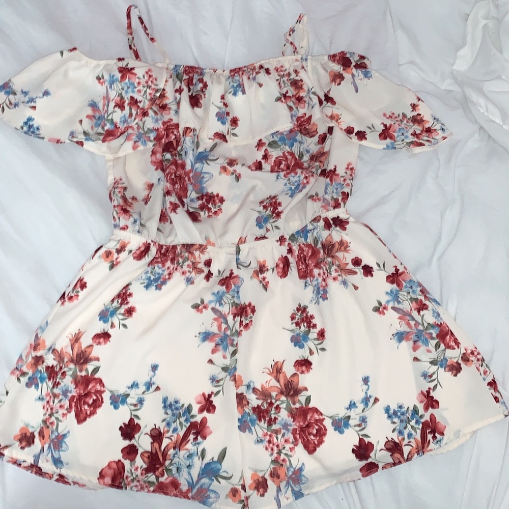 An off the shoulder romper
